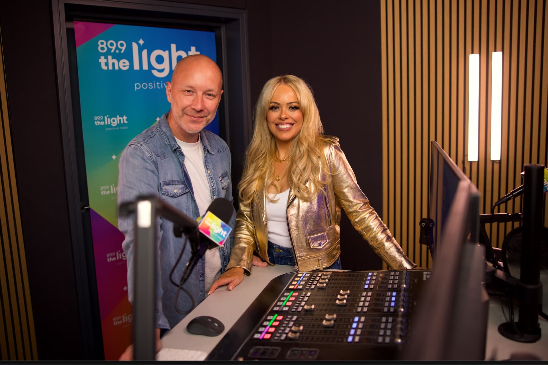 TheLight presenters smiling in the radio studio